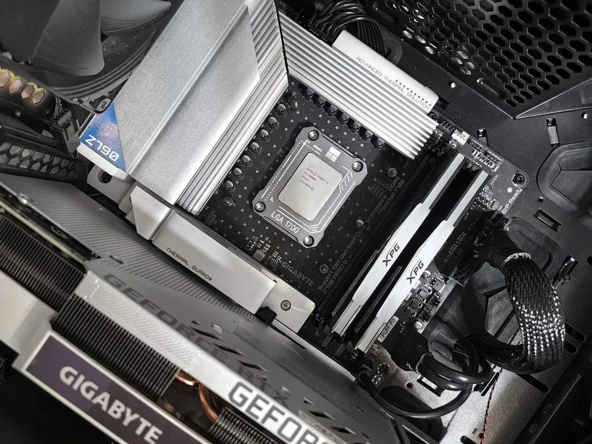 Interior view of a high-performance PC build featuring a Gigabyte motherboard and components.
